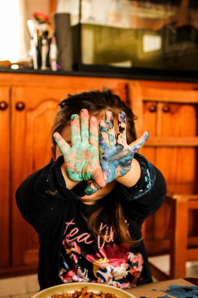 girl-covering-her-face-with-her-hands-3987023-683x1024